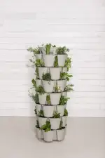 Greenstalk 7 Tier Stone Against Wall