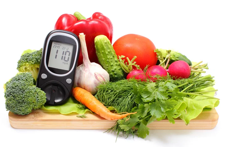 XSVWjaSp UeCpOCas Glucometer and fresh vegetables on wooden cutting board | Natural Yield